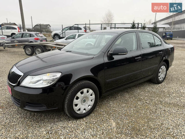Черный Шкода Октавия, объемом двигателя 1.6 л и пробегом 242 тыс. км за 7250 $, фото 1 на Automoto.ua