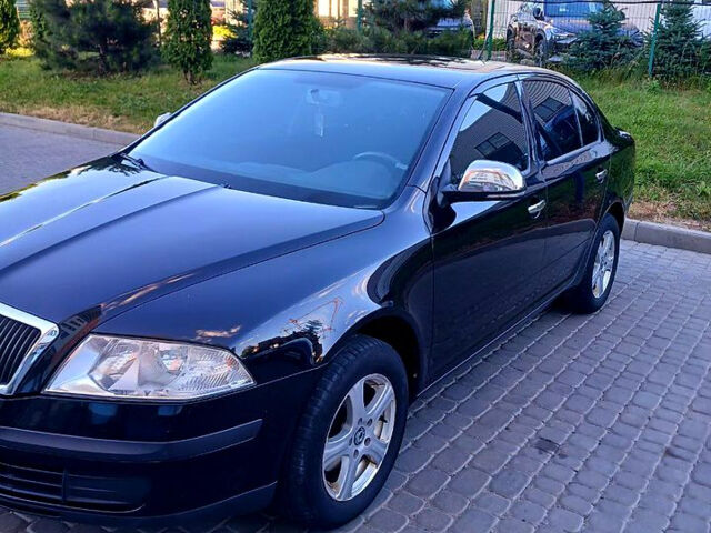 Черный Шкода Октавия, объемом двигателя 1.6 л и пробегом 218 тыс. км за 7400 $, фото 1 на Automoto.ua