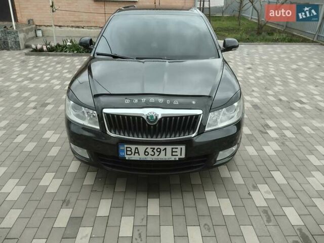 Чорний Шкода Октавія, об'ємом двигуна 1.8 л та пробігом 225 тис. км за 8600 $, фото 1 на Automoto.ua