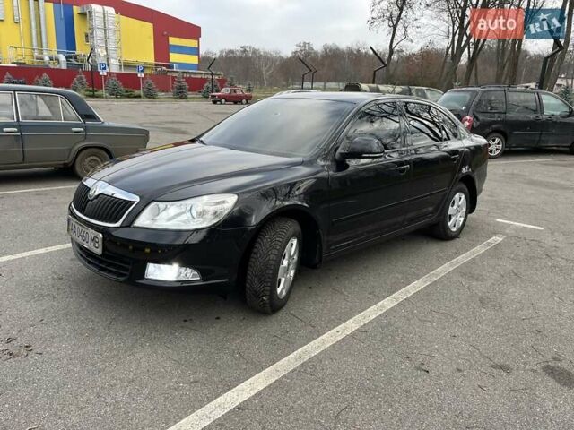 Черный Шкода Октавия, объемом двигателя 1.8 л и пробегом 73 тыс. км за 11200 $, фото 1 на Automoto.ua