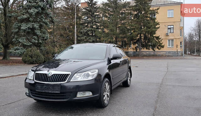 Чорний Шкода Октавія, об'ємом двигуна 1.6 л та пробігом 87 тис. км за 9300 $, фото 1 на Automoto.ua