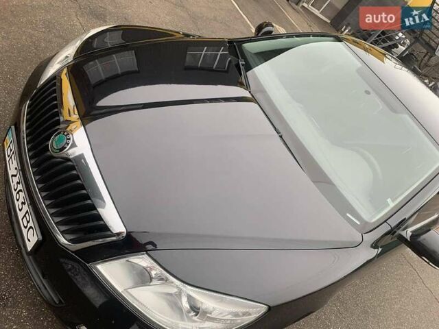 Чорний Шкода Октавія, об'ємом двигуна 1.8 л та пробігом 145 тис. км за 8700 $, фото 1 на Automoto.ua
