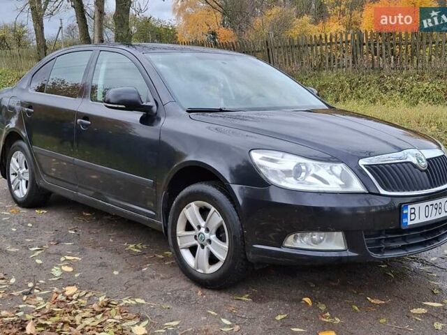 Шкода Октавия 2012 в Полтаве на Automoto.ua Черный Шкода Октавия, объемом двигателя 1.6 л и пробегом 146 тыс. км за 10000 $, фото 1 на Automoto.ua