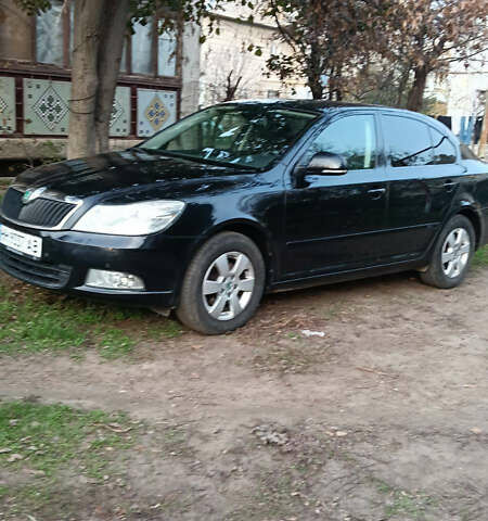 Черный Шкода Октавия, объемом двигателя 1.6 л и пробегом 220 тыс. км за 11500 $, фото 1 на Automoto.ua
