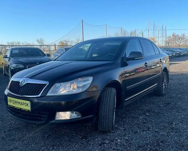 Чорний Шкода Октавія, об'ємом двигуна 1.8 л та пробігом 222 тис. км за 6790 $, фото 1 на Automoto.ua