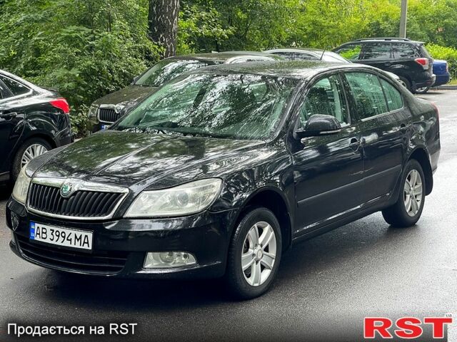 Черный Шкода Октавия, объемом двигателя 1.8 л и пробегом 230 тыс. км за 7200 $, фото 1 на Automoto.ua