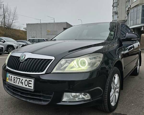 Чорний Шкода Октавія, об'ємом двигуна 2 л та пробігом 240 тис. км за 10900 $, фото 1 на Automoto.ua