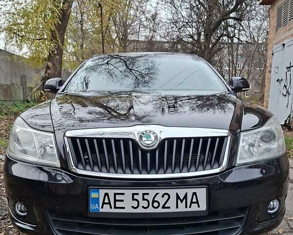 Черный Шкода Октавия, объемом двигателя 1.8 л и пробегом 173 тыс. км за 9400 $, фото 1 на Automoto.ua