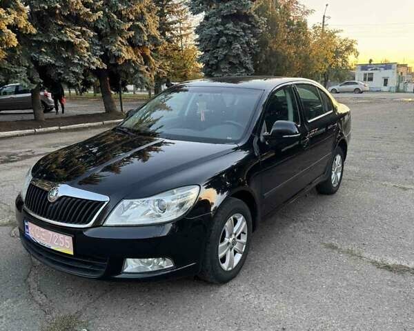 Черный Шкода Октавия, объемом двигателя 1.4 л и пробегом 232 тыс. км за 7500 $, фото 1 на Automoto.ua