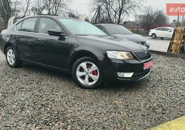 Черный Шкода Октавия, объемом двигателя 1.4 л и пробегом 221 тыс. км за 10900 $, фото 1 на Automoto.ua