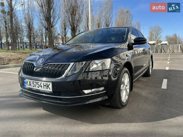 Черный Шкода Октавия, объемом двигателя 1.4 л и пробегом 113 тыс. км за 15100 $, фото 1 на Automoto.ua