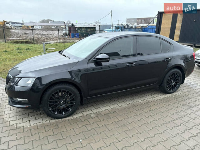 Черный Шкода Октавия, объемом двигателя 1.8 л и пробегом 210 тыс. км за 14000 $, фото 1 на Automoto.ua