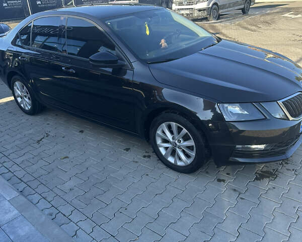 Черный Шкода Октавия, объемом двигателя 1.6 л и пробегом 230 тыс. км за 12150 $, фото 1 на Automoto.ua