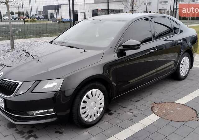 Чорний Шкода Октавія, об'ємом двигуна 1.6 л та пробігом 178 тис. км за 14300 $, фото 1 на Automoto.ua