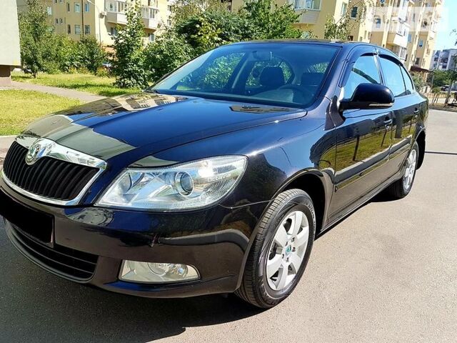 Чорний Шкода Октавія, об'ємом двигуна 1.8 л та пробігом 88 тис. км за 11650 $, фото 1 на Automoto.ua