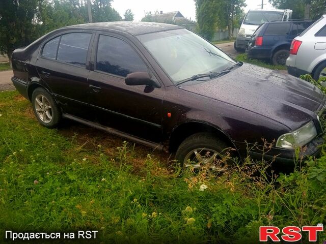 Фиолетовый Шкода Октавия, объемом двигателя 1.6 л и пробегом 320 тыс. км за 1900 $, фото 1 на Automoto.ua