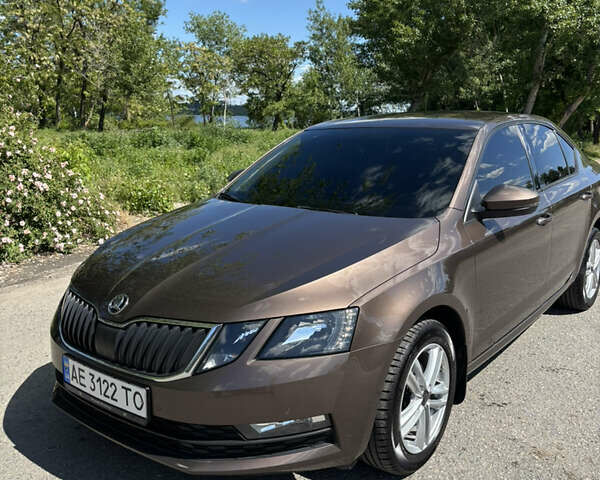 Коричневый Шкода Октавия, объемом двигателя 1.4 л и пробегом 128 тыс. км за 17000 $, фото 1 на Automoto.ua