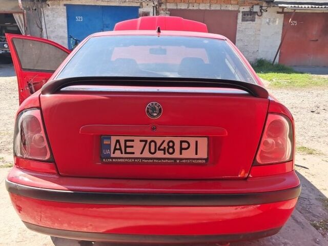 Красный Шкода Октавия, объемом двигателя 1.6 л и пробегом 234 тыс. км за 2600 $, фото 1 на Automoto.ua