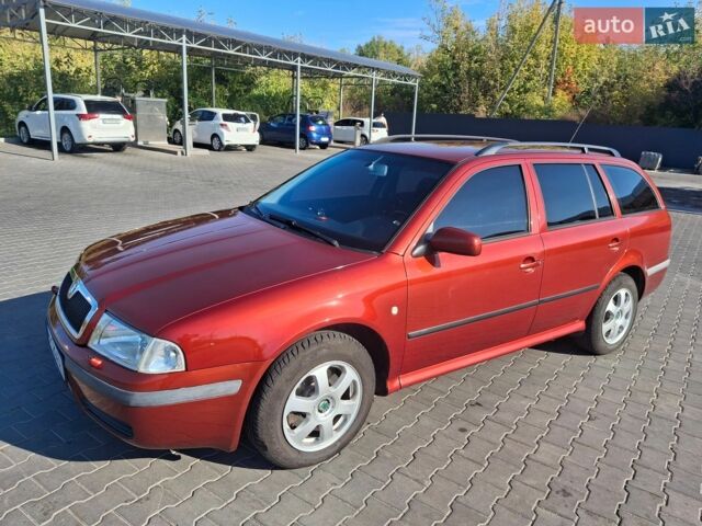 Червоний Шкода Октавія, об'ємом двигуна 2 л та пробігом 233 тис. км за 4999 $, фото 1 на Automoto.ua