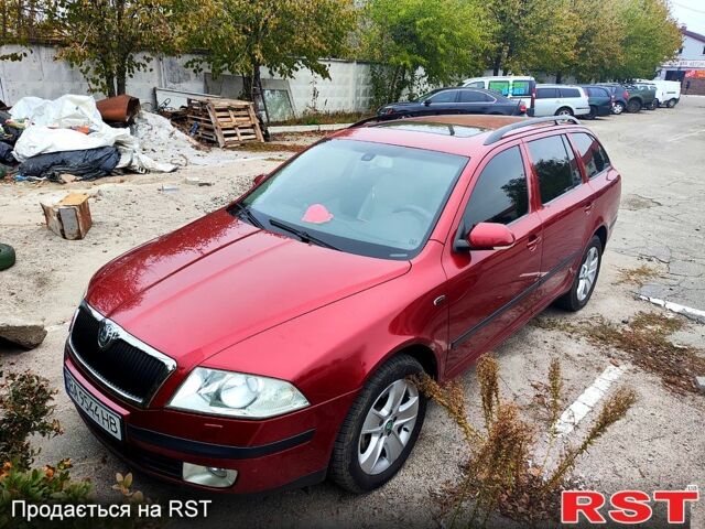 Красный Шкода Октавия, объемом двигателя 2 л и пробегом 235 тыс. км за 5900 $, фото 1 на Automoto.ua