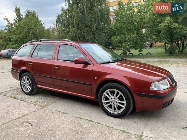 Красный Шкода Октавия, объемом двигателя 1.6 л и пробегом 218 тыс. км за 6350 $, фото 1 на Automoto.ua