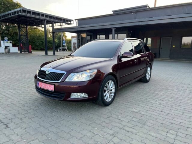Красный Шкода Октавия, объемом двигателя 1.8 л и пробегом 128 тыс. км за 8190 $, фото 1 на Automoto.ua