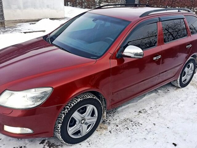 Красный Шкода Октавия, объемом двигателя 2 л и пробегом 243 тыс. км за 8400 $, фото 1 на Automoto.ua