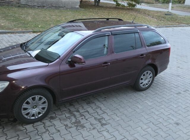 Красный Шкода Октавия, объемом двигателя 1.6 л и пробегом 266 тыс. км за 6500 $, фото 1 на Automoto.ua