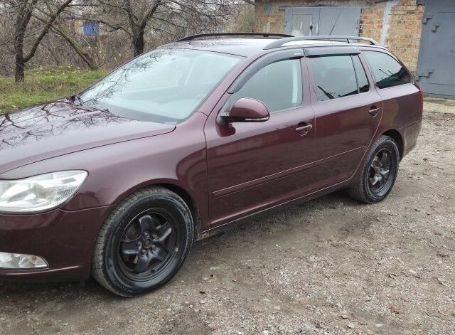 Червоний Шкода Октавія, об'ємом двигуна 1.6 л та пробігом 266 тис. км за 7700 $, фото 1 на Automoto.ua