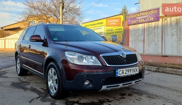 Красный Шкода Октавия, объемом двигателя 2.01 л и пробегом 356 тыс. км за 10300 $, фото 1 на Automoto.ua