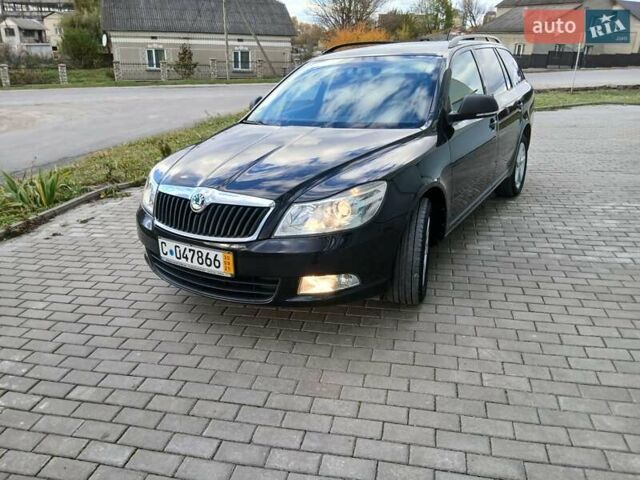 Красный Шкода Октавия, объемом двигателя 2 л и пробегом 215 тыс. км за 8650 $, фото 1 на Automoto.ua