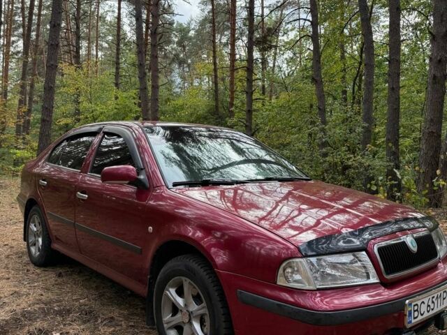 Красный Шкода Октавия, объемом двигателя 1.8 л и пробегом 390 тыс. км за 3500 $, фото 1 на Automoto.ua