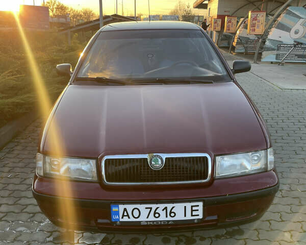 Красный Шкода Октавия, объемом двигателя 1.6 л и пробегом 280 тыс. км за 2650 $, фото 1 на Automoto.ua