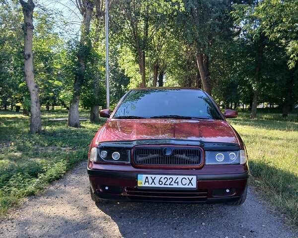 Красный Шкода Октавия, объемом двигателя 2 л и пробегом 287 тыс. км за 5000 $, фото 1 на Automoto.ua