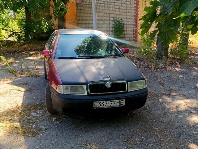 Красный Шкода Октавия, объемом двигателя 2 л и пробегом 347 тыс. км за 3000 $, фото 1 на Automoto.ua