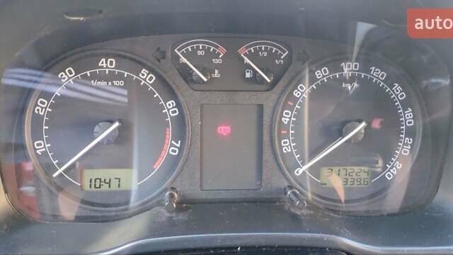 Красный Шкода Октавия, объемом двигателя 2 л и пробегом 317 тыс. км за 4300 $, фото 1 на Automoto.ua