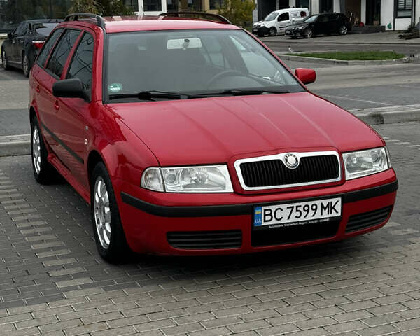 Красный Шкода Октавия, объемом двигателя 1.6 л и пробегом 229 тыс. км за 3999 $, фото 1 на Automoto.ua