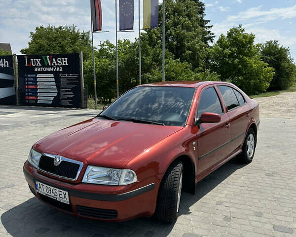 Красный Шкода Октавия, объемом двигателя 1.6 л и пробегом 169 тыс. км за 4999 $, фото 1 на Automoto.ua