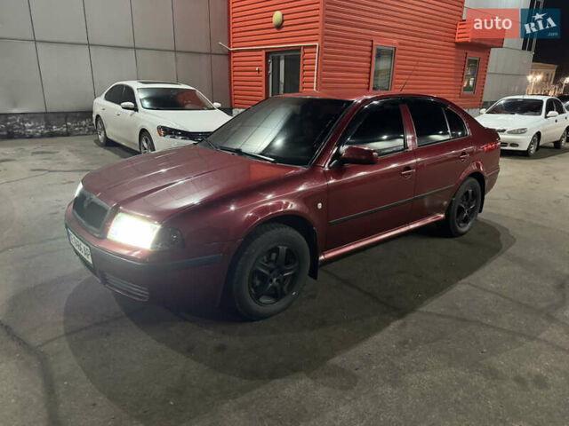 Червоний Шкода Октавія, об'ємом двигуна 1.6 л та пробігом 219 тис. км за 5600 $, фото 1 на Automoto.ua