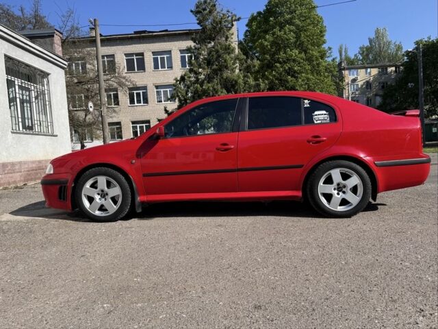 Красный Шкода Октавия, объемом двигателя 1.8 л и пробегом 159 тыс. км за 5990 $, фото 1 на Automoto.ua