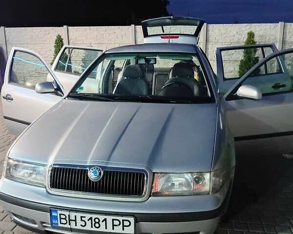 Серый Шкода Октавия, объемом двигателя 1.6 л и пробегом 211 тыс. км за 5400 $, фото 1 на Automoto.ua