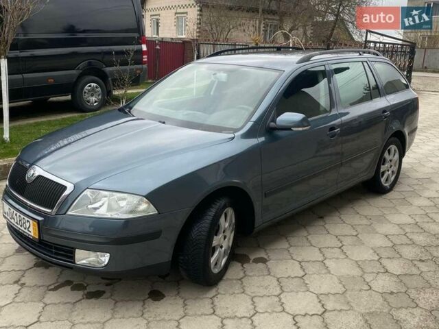 Серый Шкода Октавия, объемом двигателя 1.6 л и пробегом 225 тыс. км за 5399 $, фото 1 на Automoto.ua