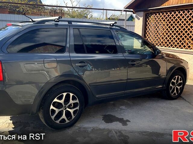 Сірий Шкода Октавія, об'ємом двигуна 2 л та пробігом 245 тис. км за 7900 $, фото 1 на Automoto.ua