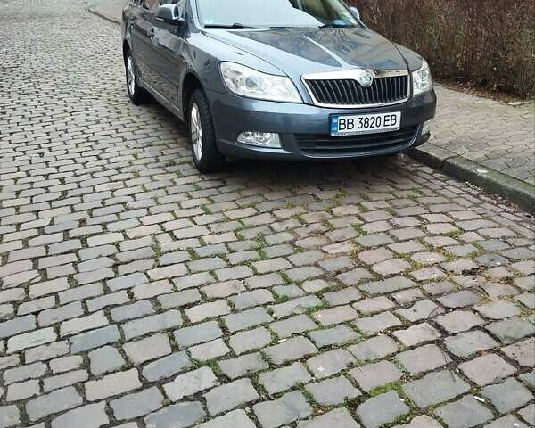 Сірий Шкода Октавія, об'ємом двигуна 1.2 л та пробігом 200 тис. км за 5550 $, фото 1 на Automoto.ua