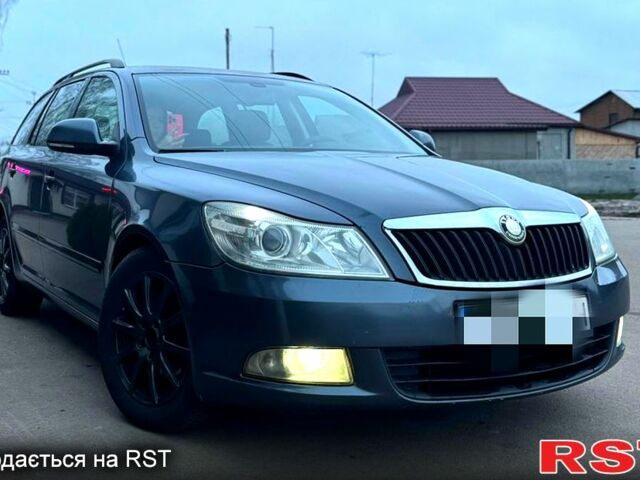 Серый Шкода Октавия, объемом двигателя 1.6 л и пробегом 33000 тыс. км за 6900 $, фото 1 на Automoto.ua