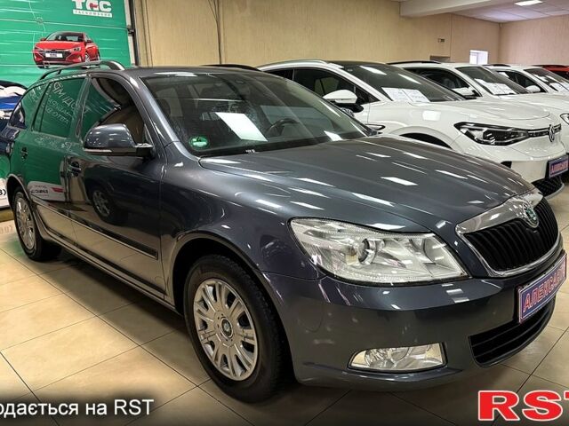 Серый Шкода Октавия, объемом двигателя 1.4 л и пробегом 18900 тыс. км за 7600 $, фото 1 на Automoto.ua