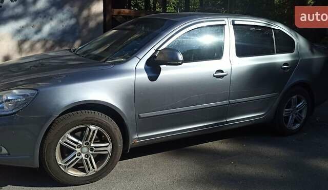 Серый Шкода Октавия, объемом двигателя 1.8 л и пробегом 232 тыс. км за 8200 $, фото 1 на Automoto.ua