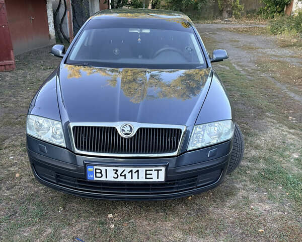 Серый Шкода Октавия, объемом двигателя 1.6 л и пробегом 230 тыс. км за 7200 $, фото 1 на Automoto.ua