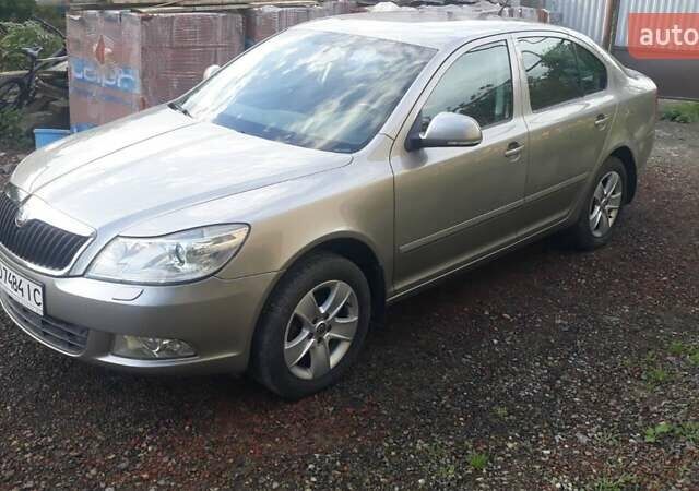 Серый Шкода Октавия, объемом двигателя 1.4 л и пробегом 224 тыс. км за 6400 $, фото 1 на Automoto.ua