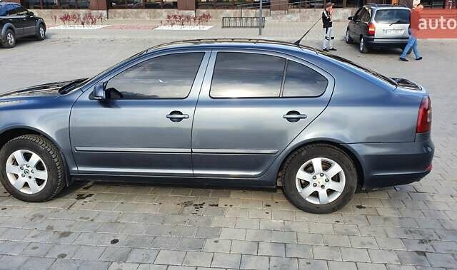 Сірий Шкода Октавія, об'ємом двигуна 1.8 л та пробігом 235 тис. км за 7800 $, фото 1 на Automoto.ua